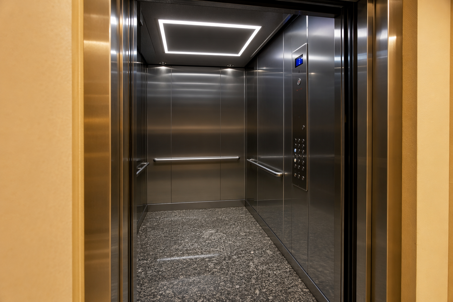 Modernized elevator cab interior in a Sarasota Florida residential building showing ADA-compliant fixtures, LED lighting, and updated stainless steel finishes after full code compliance upgrade